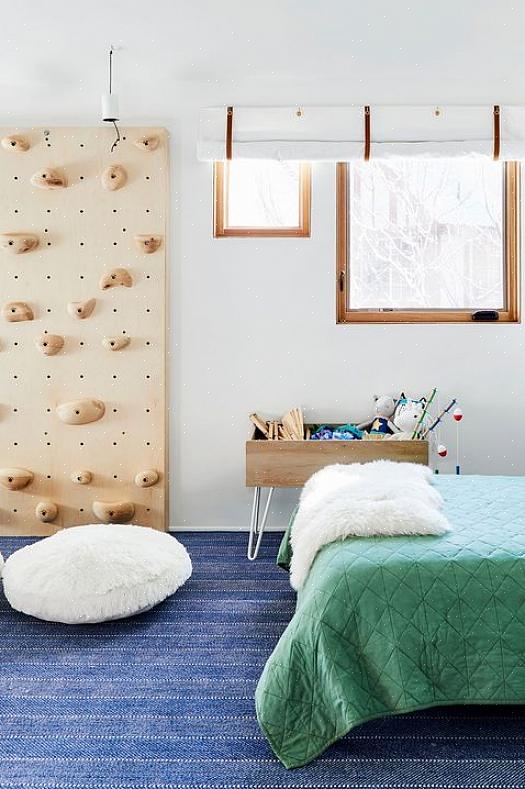 Cette chambre moderne utilise des éléments de décoration simples avec des couleurs