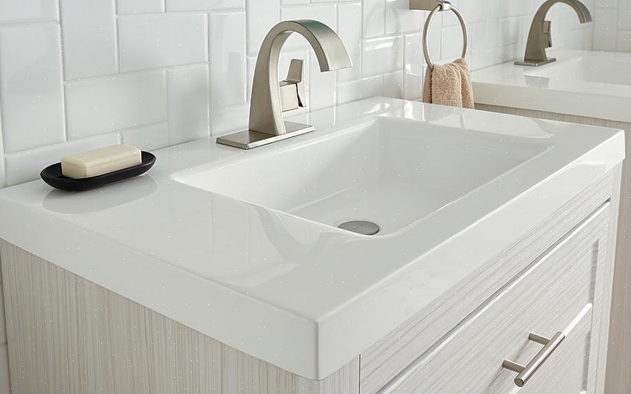 Les dessus de vanité de salle de bain peuvent être fabriqués à partir d'une variété de matériaux de comptoir