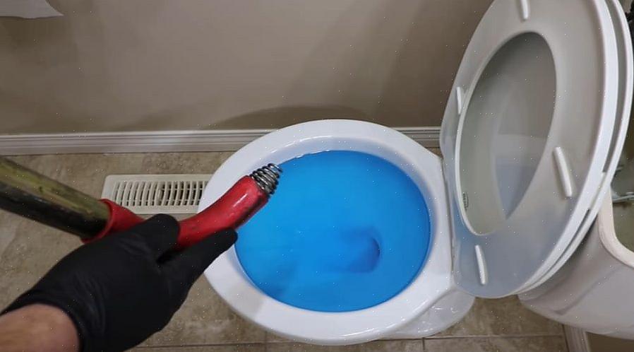Comment nettoyer un siphon de toilette avec une vis sans fin